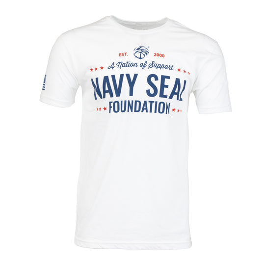 White shirt with blue text "A Nation of Support Navy SEAL FOUNDATION"