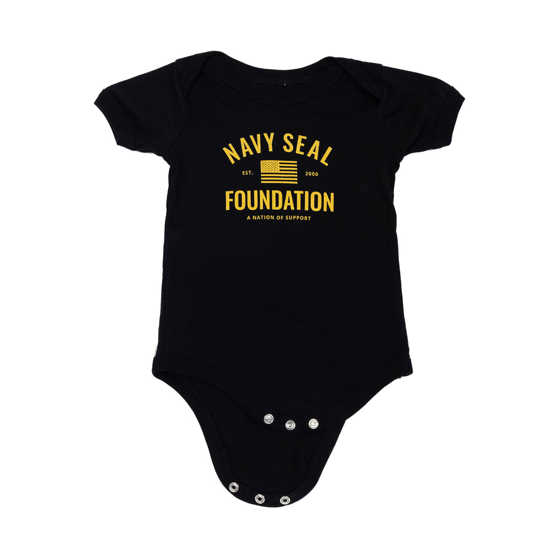 Black Onesie with yellow text "NAVY SEAL FOUNDATION A NATION OF SUPPORT" with American Flag in the center