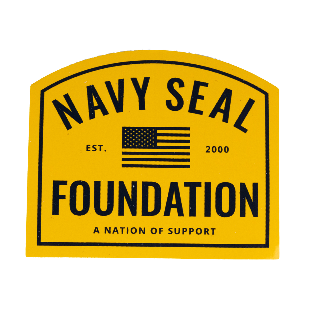Yellow sticker with black text "NAVY SEAL FOUNDATION A NATION OF SUPPORT EST. 2000" with black American flag