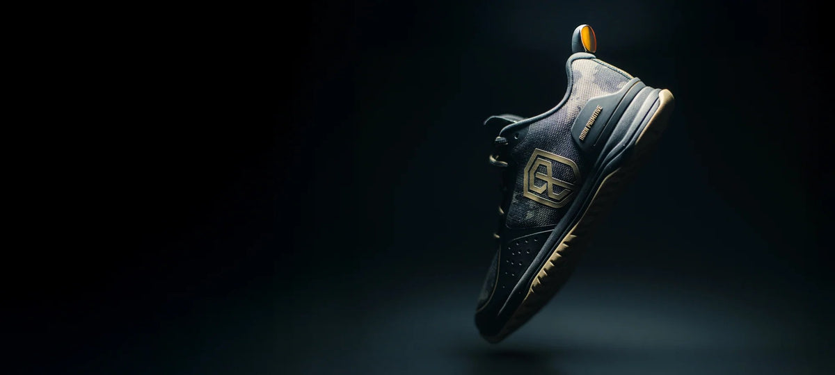 NSF Edition Savage 1 training shoe on a dark background
